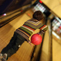 What is the Minimum Age Requirement to Bowl at a Bowling Alley in Suffolk County, NY?