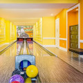 What Amenities Does Each Bowling Lane Rental Package Offer in Suffolk County, NY?
